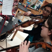Coral reefs inspire more than just scientists! Emma (left) and Gayatri (right) practicing for their performance of original music written by Gayatri.